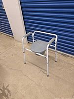 Commode chair assembled with seat lid closed