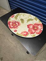 Top view showing full red floral design and oval shape