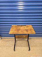 Front view of laptop desk cart showing tabletop and frame