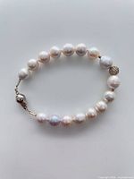 Full view of pearl bracelet showing pearl size, shape, colour and clasp placement