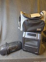 All three items: Dakota lunch bag on top, electric heater below, Panasonic radio cassette at side