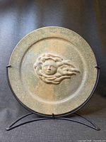 Front view of ceramic plate on stand