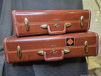 Front view of both Samsonite suitcases stacked