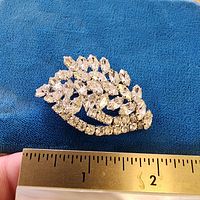 Brooch on ruler showing 1.75 inch width