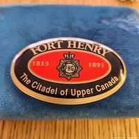 Front view displaying Fort Henry design and dates