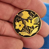 Front view showing full design of brooch