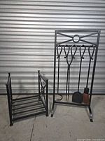 Full view of tool hanger with tools beside log rack