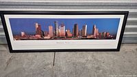 Front view of framed panoramic print showing Houston skyline and frame