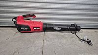 Full view of Hyper Tough blower left side showing branding and cord