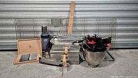 Full lot showing knives box, thermos, loaf pans, utensil bowl, cooling racks