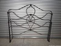 Headboard and footboard leaning together showing overall design