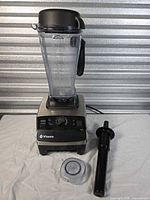 Vitamix 5200 blender base, container, lid plug and tamper