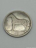 Reverse side showing horse, Leat Coroin legend, denomination 2/6