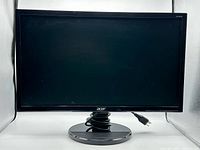 Front view of Acer K222HQL monitor with stand and coiled power cord