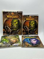 Front view of all four World of Warcraft strategy guides