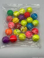 Full bag of assorted coloured golf balls
