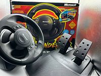 Steering wheel, pedal base and retail box