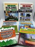 Front view showing all six Minecraft guidebooks