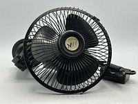 Front view of circular fan with protective grill and blades