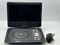 DVD player open showing screen, control panel and adapter cord