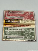 Wallet open showing 10 ¢ and 5 ¢ coupons