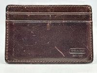 Front view showing card slots and Coach logo