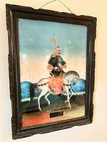 Full view of framed reverse glass painting