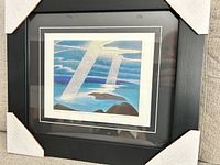 Frontal view of framed print showing artwork, mat and frame