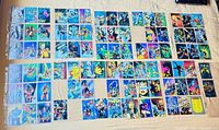 All 87 trading cards laid out showing fronts