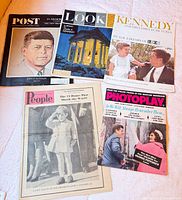 Group shot of all five publications fanned out