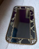 Front angled view of rectangular mirror tray showing rope metal frame, heart corners, crackled gold border