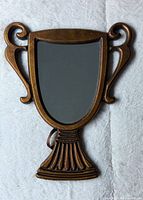 Front view showing full trophy shape and bronze finish