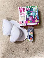 Front view showing both caps, Tulip kit, smaller dye kit