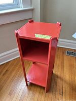 overall view showing front and side, middle shelf visible