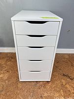 Front view showing entire white drawer unit