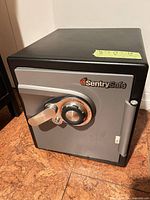 Front view of SentrySafe showing dial, handle and logo