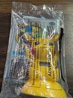 Front view of sealed Pikachu toy showing figure and insert