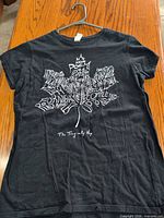 Full view of front showing maple leaf graphic and logo
