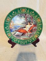 Front of plate on stand showing full design