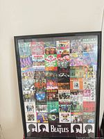 Front view of framed Beatles collage wall art