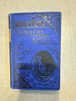 Front cover showing decorative blue cloth binding and title