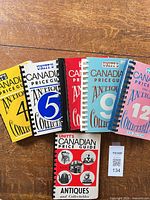 Front covers of all six guides showing titles and volume numbers