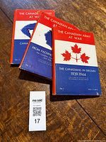 Three Canadian Army At War volumes stacked