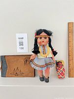 All three items together beside ruler for scale