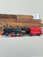 Locomotive and caboose side-by-side