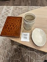 Notebook, toothbrush holder, soap dish group shot