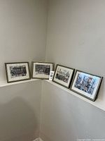 All four framed Anton Pieck prints displayed on ledge