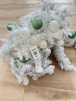 White garland strands grouped together showing overall lot