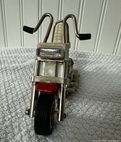 Front view of Tonka chopper toy showing forks, headlamp, and front tire