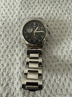 Front view of Swatch Irony watch showing dial, sub-dials and bracelet